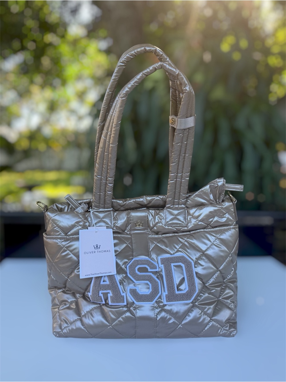 Oliver Thomas Metallic Taupe Quilted Tote with ASD Appliqué